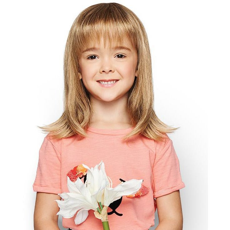 Kid wearing the Pretty in Fabulous mid-length wig with softly flipped layers