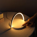 Stevvex dimmable LED table lamp with wireless charging base