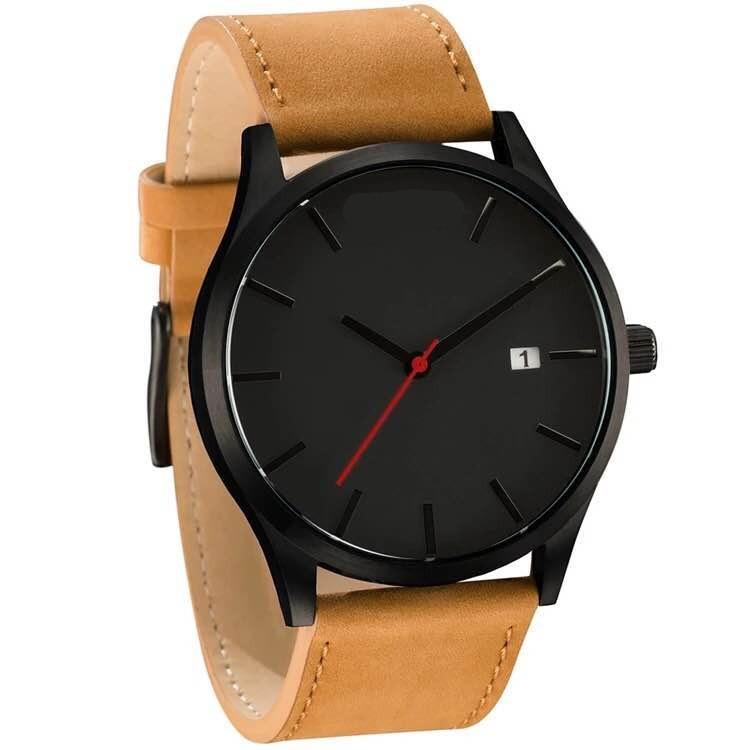 Minimalist men's watch with leather strap and date display, available in black, tan, and brown