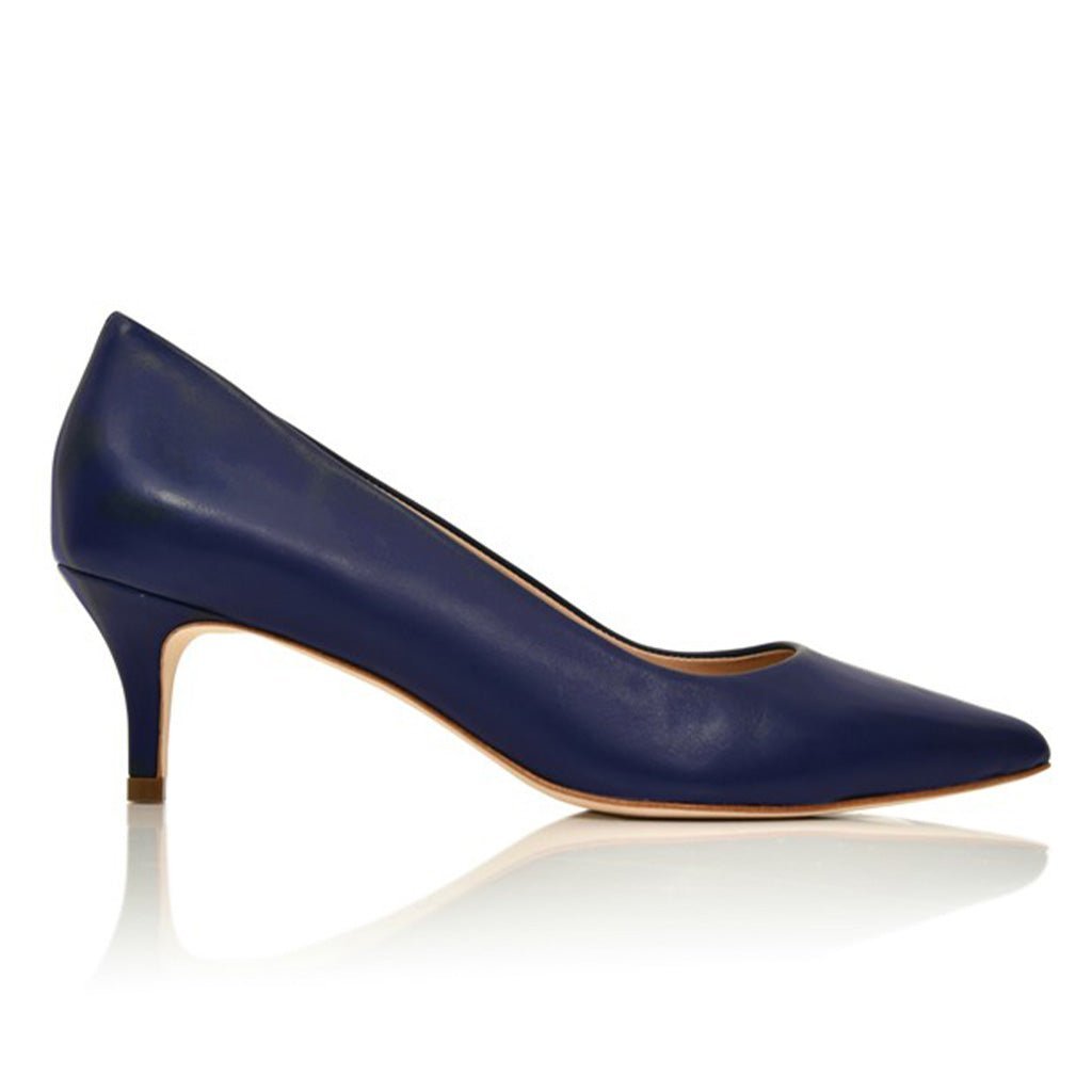 Side profile of a Navy Lux Nappa leather pointed toe pump with a 55mm kitten heel.