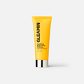 Yellow tube of Gleamin Clarifying Brightening Cleanser with key ingredients listed including 2% Salicylic Acid, Vitamin C, and Turmeric.