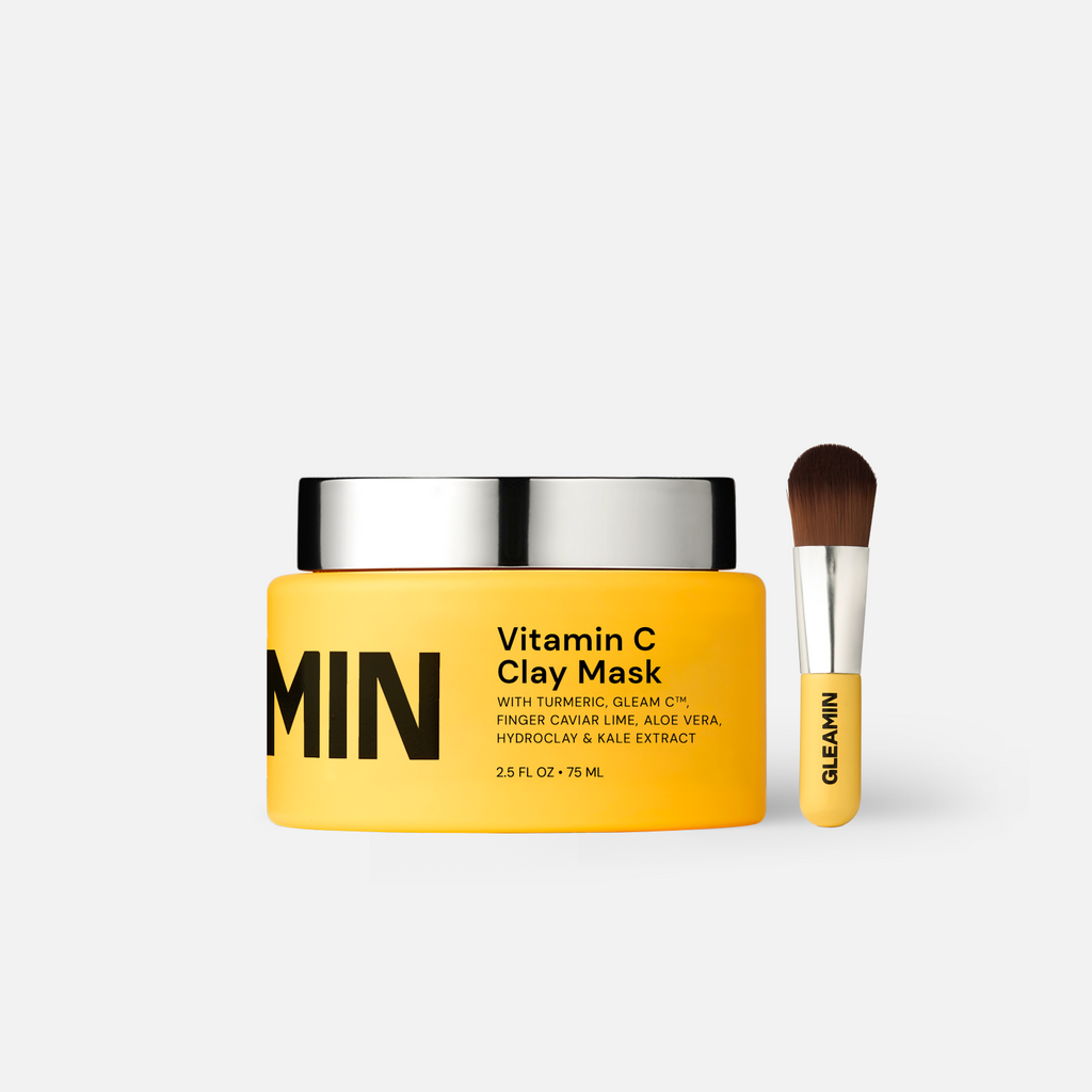 Gleamin Vitamin C Clay Mask jar with yellow packaging and matching applicator brush