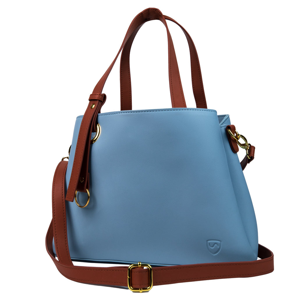 A light blue purse with brown handles and shoulder strap, featuring a clean modern look.