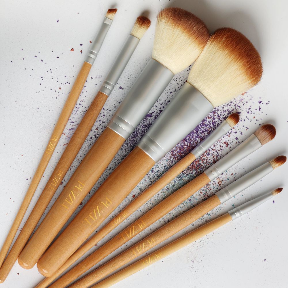 Set of 8 professional vegan makeup brushes in tan, silver, and cream