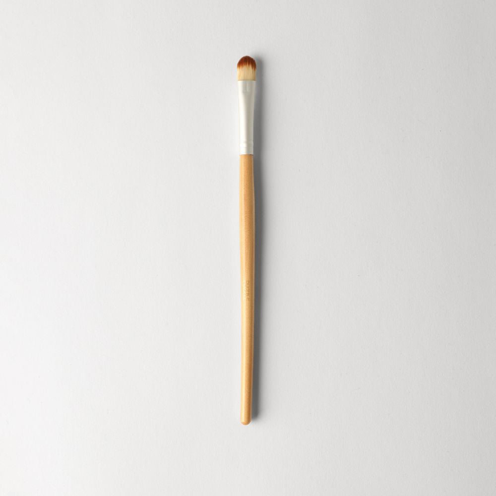 Light-brown and silver medium eyeshadow brush with wooden handle
