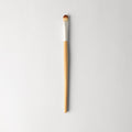 Light-brown and silver medium eyeshadow brush with wooden handle