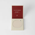 Buildable vegan highlighter compacts in champagne, gold, pink, and white.