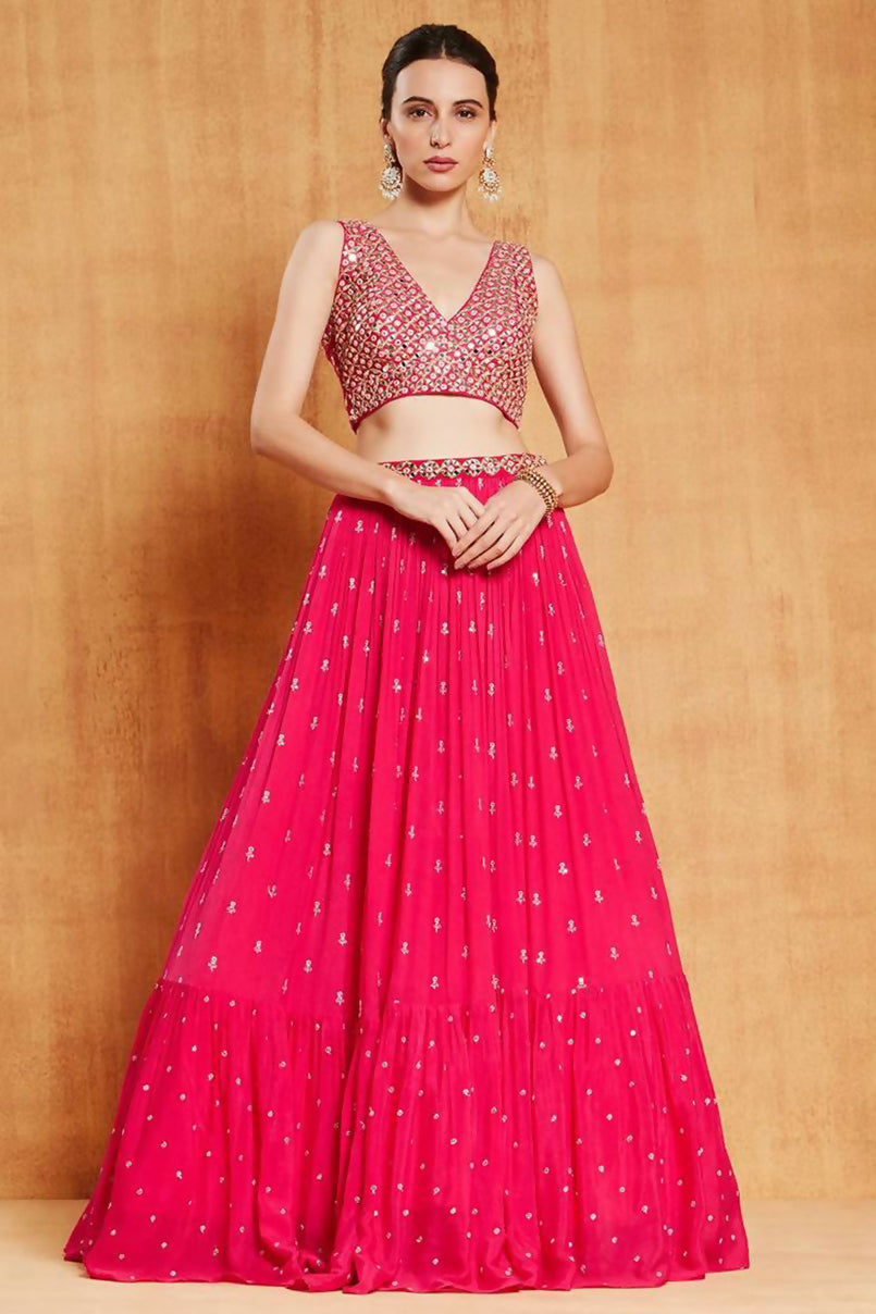 Rani pink faux georgette lehenga choli with zari and sequin embroidery details