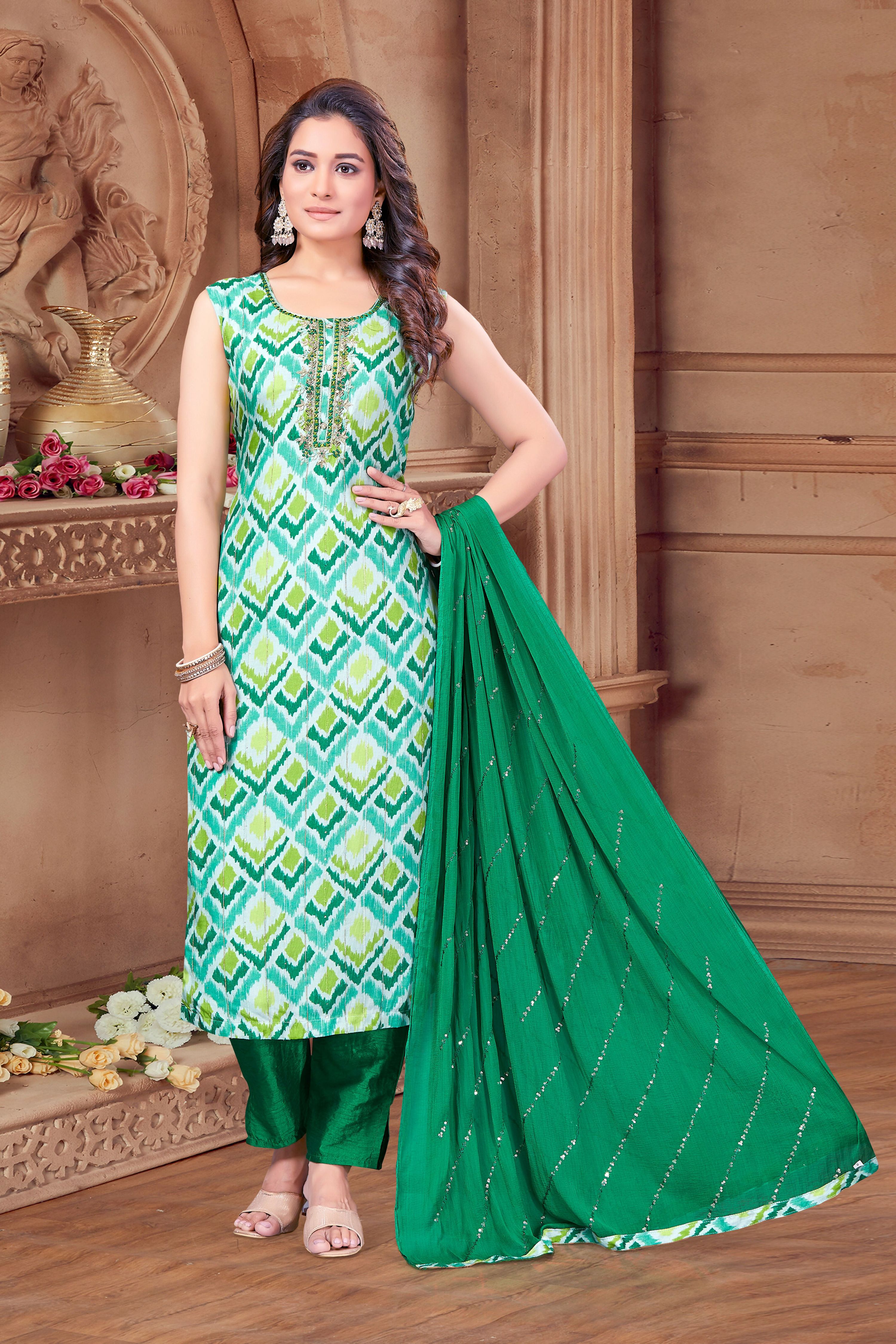 Elegant green georgette kurta set featuring intricate hand work details