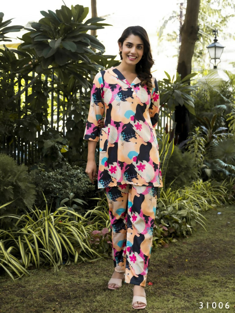 Woman wearing a fashionable Manya multi-colored digital print muslin cotton co-ord set