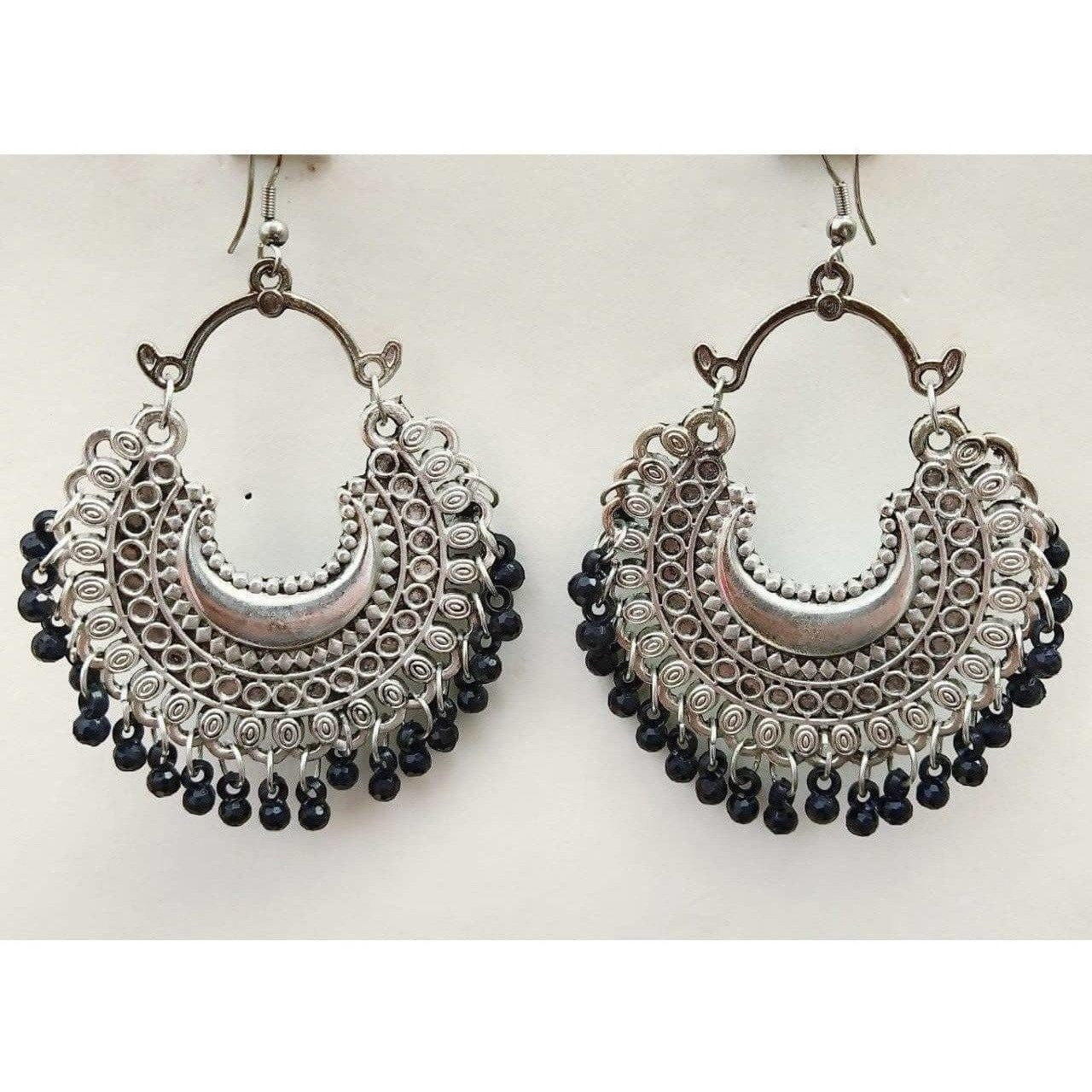 Half moon shaped silver oxidized earrings with black glass pearl accents