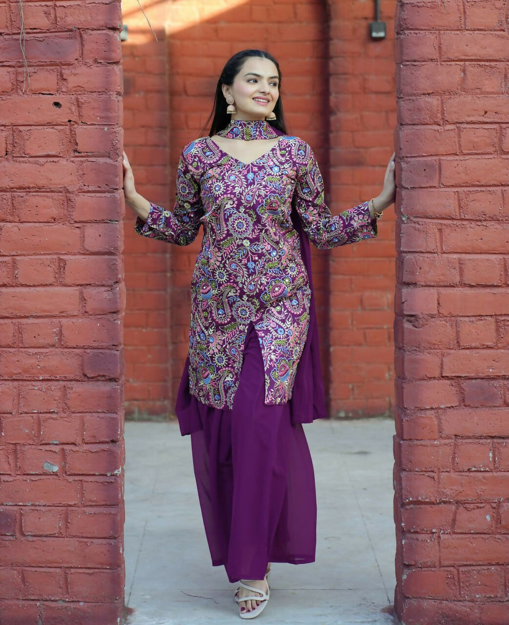 Wine silk kurti with detailed embroidery paired with matching sharara pants for women