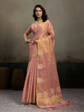 Light pink tissue silk saree with a matching light pink blouse