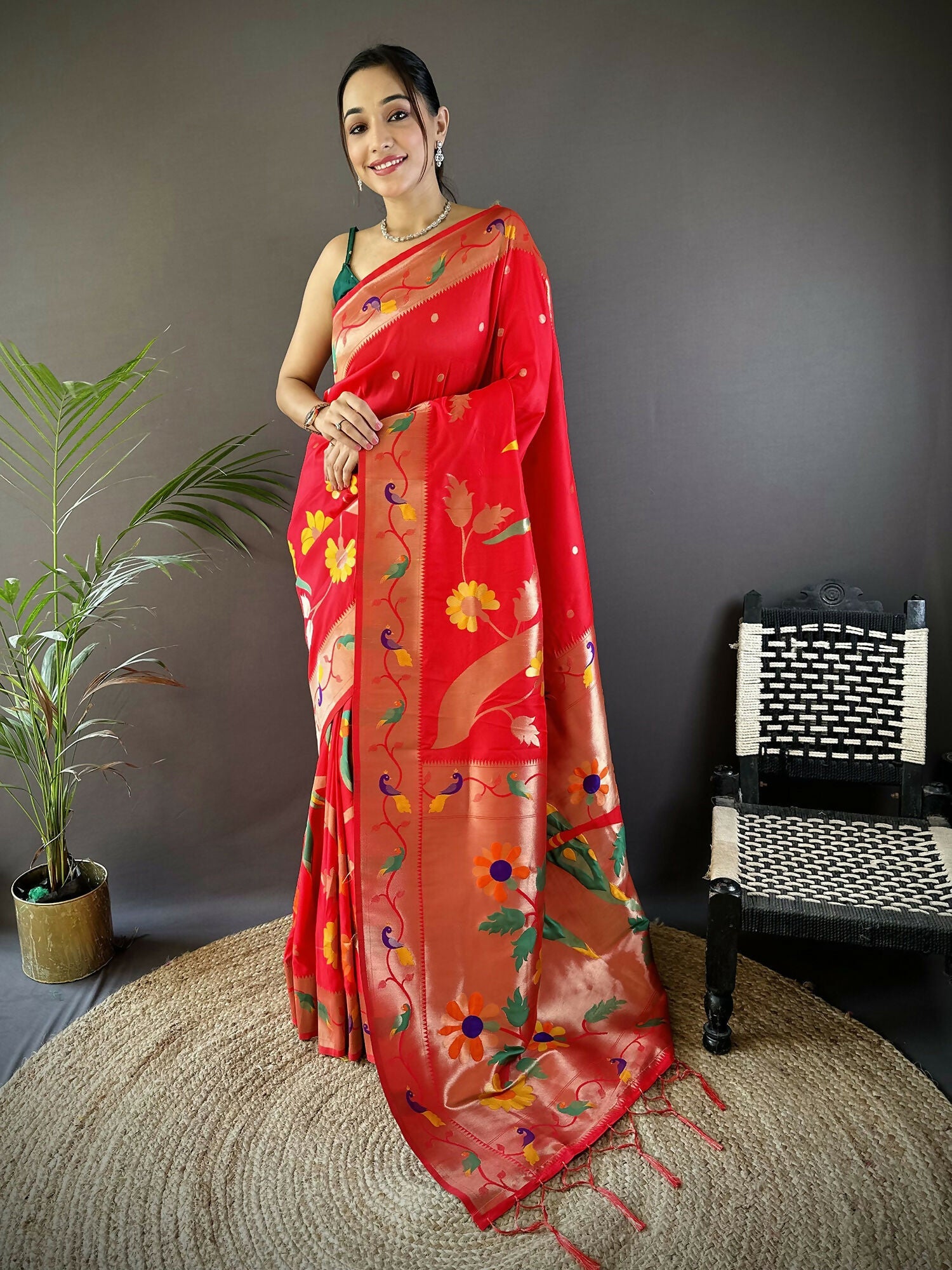 Red soft silk Paithani saree with elegant zari-woven floral details