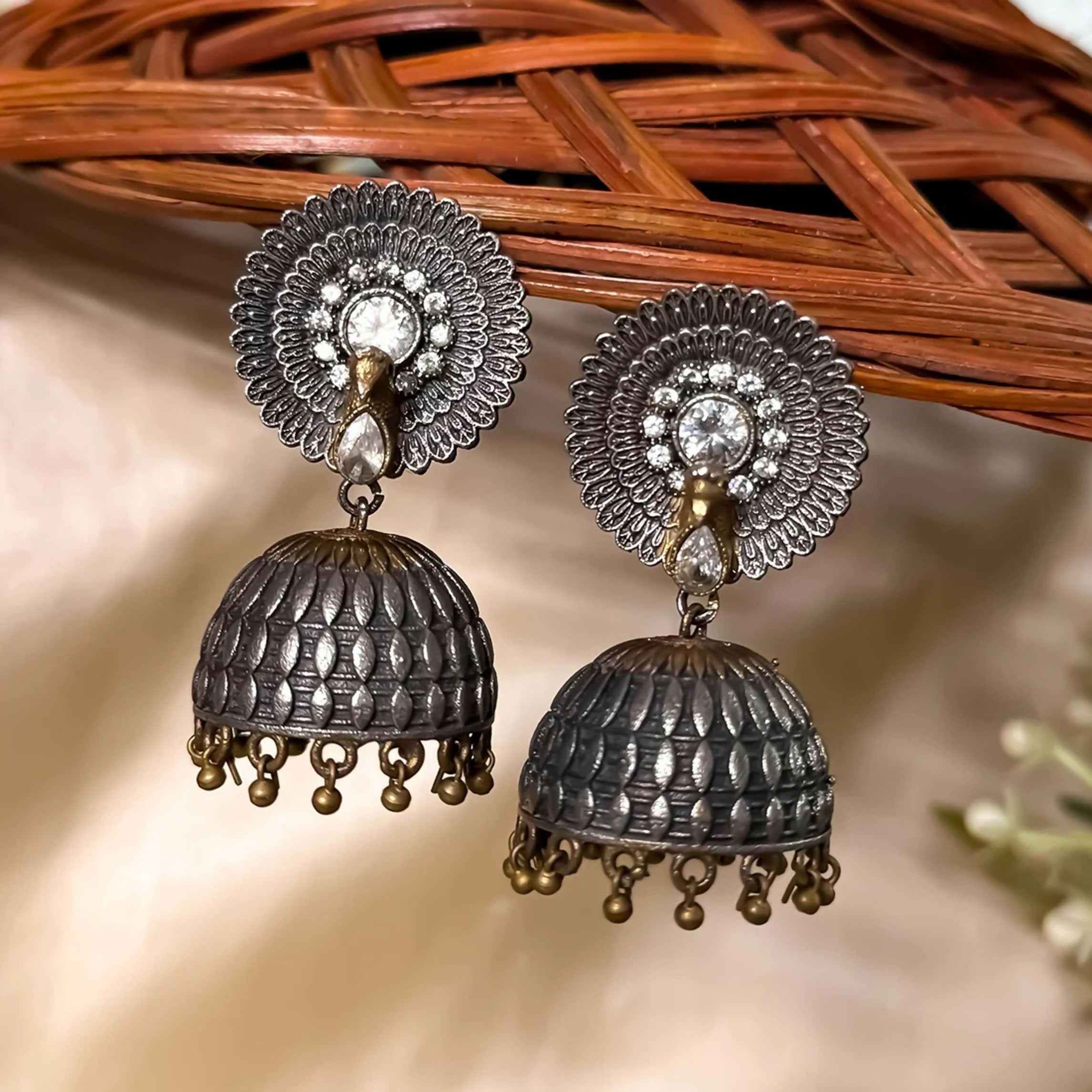 Mayuri 3D Jhumka earrings with Crystal White zircons and oxidized brass finish.