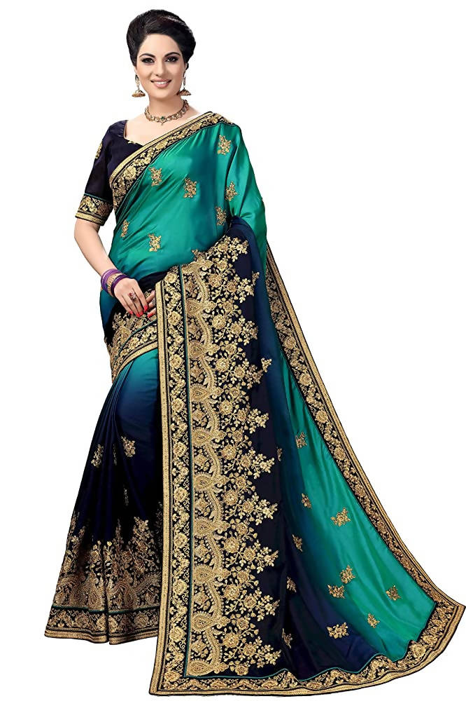 Blue silk saree featuring heavy lace embroidery and barfi texture pattern