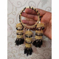 Gold tone bangles with black pearls and hanging black silk thread jhumkas