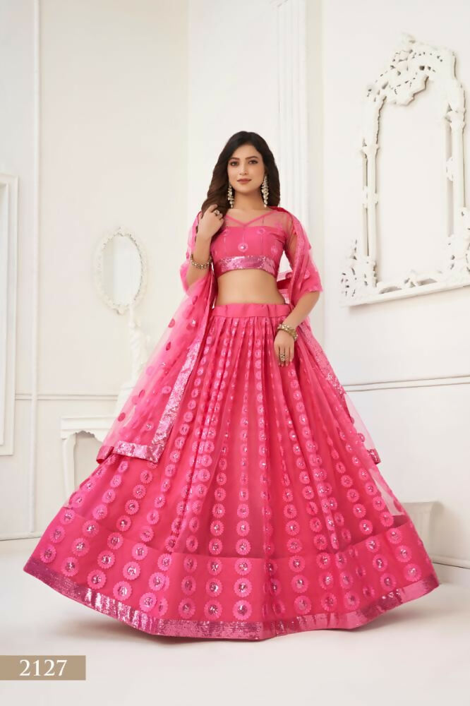 Bright Pink wedding lehenga crafted from butterfly net with matching tone-to-tone sequin and thread embroidery.