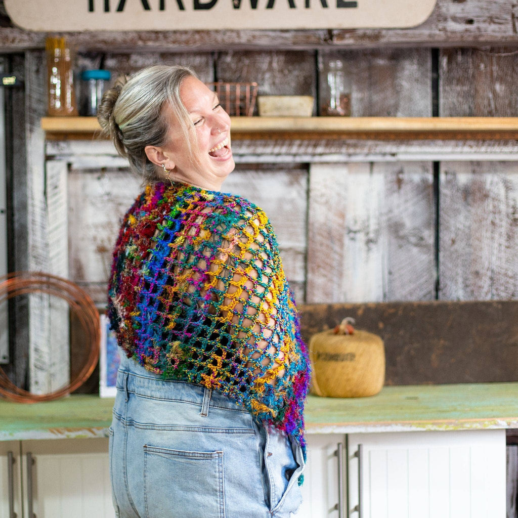 Finished QuadraMesh shawl made with textured hand-spun silk yarn in a crochet kit