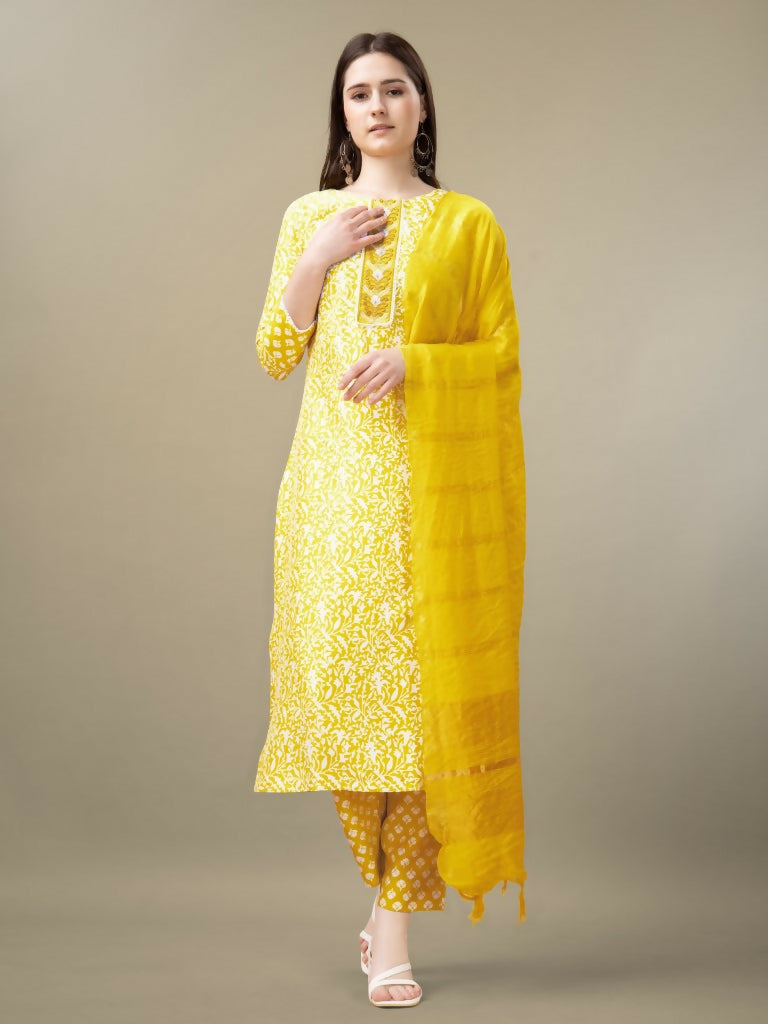 Vibrant yellow rayon straight kurta with embroidery and sequence detail, styled with trousers and matching dupatta.