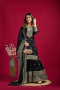 Classic black silk kurta set with detailed sequins, zari, and thread embroidery.