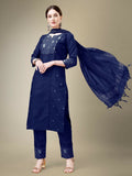 A woman wearing a Navy Blue cotton blend straight kurta with embroidery and fancy lace work, paired with trousers and a dupatta.