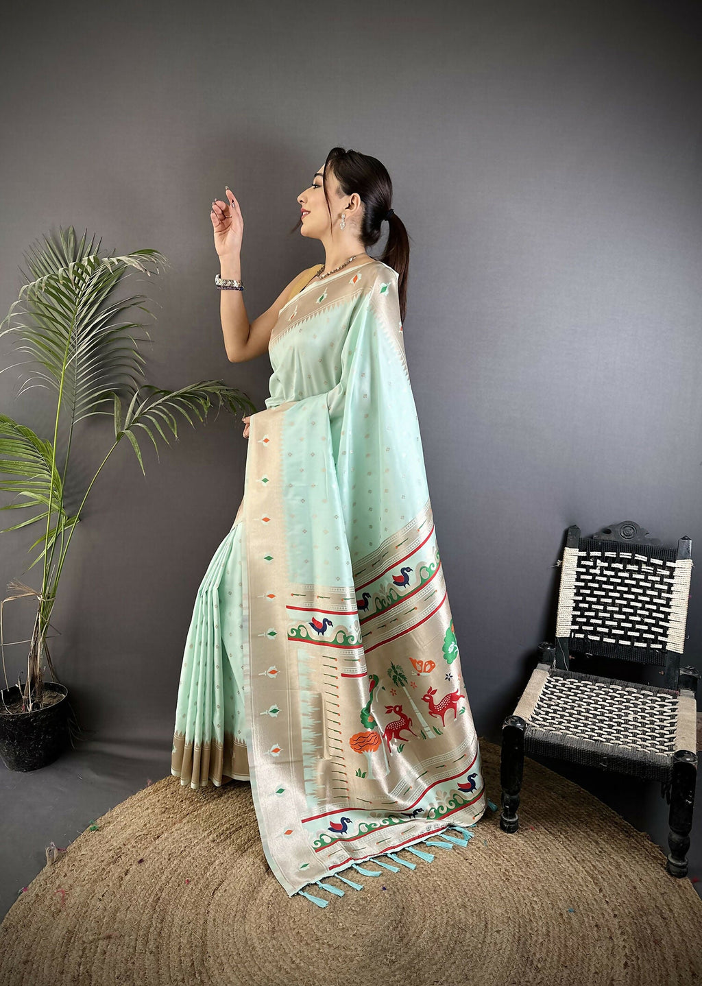 Sea Green Peacock and Floral Motif Lichi Silk Kanchipuram Saree
