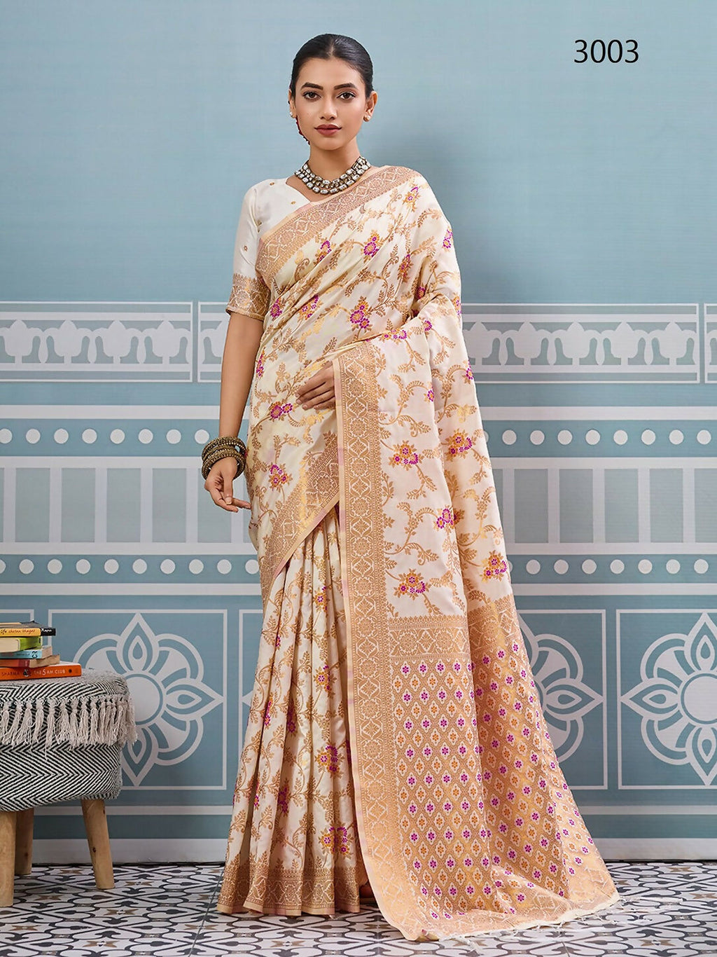 Elegant cream silk saree with a matching blouse for a minimalist look.