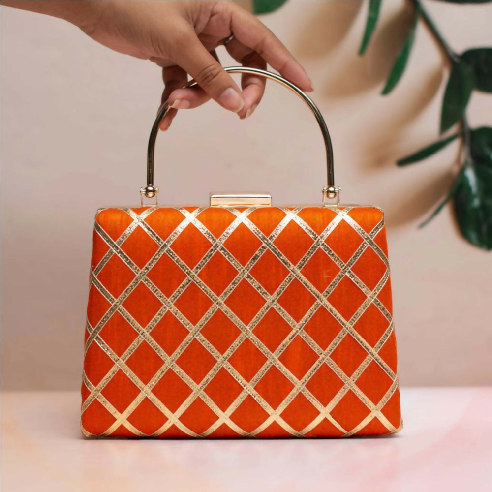 Orange Gota Patti fabric clutch bag with ornate traditional embroidery