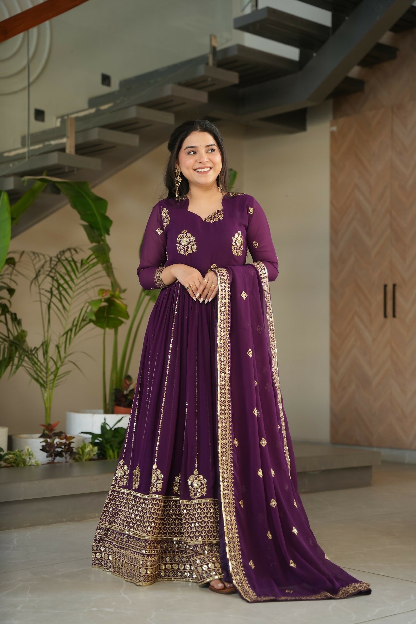 Wine georgette kurta set featuring sequence embroidery and cotton inner