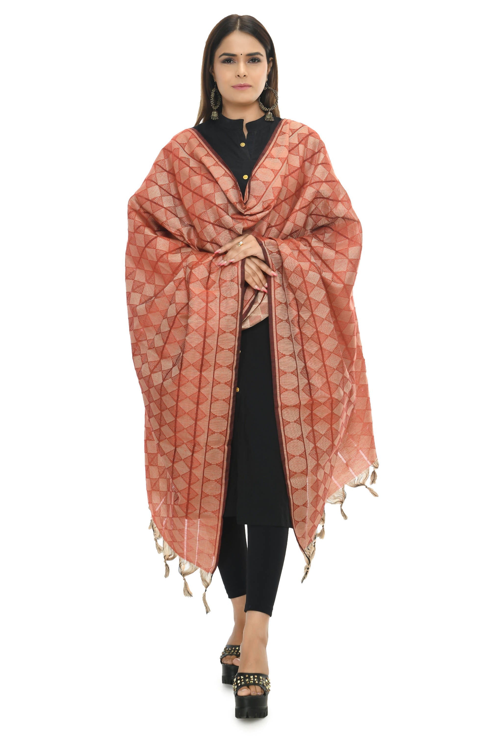 A vibrant red handloom cotton dupatta draped elegantly.