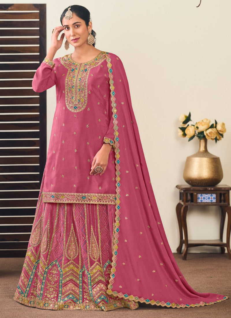 Peach Chinon Silk lehenga style suit with intricate embroidery and gota patti