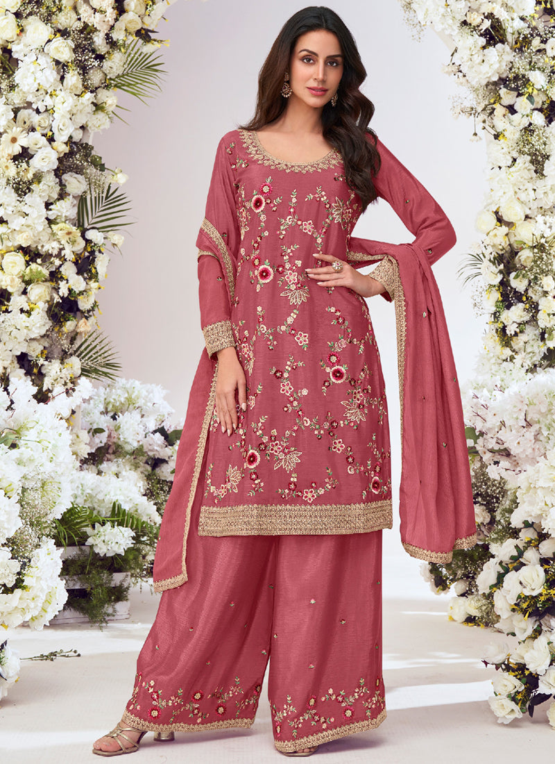 A front view of a peach Chinon silk palazzo suit with intricate embroidery and gota patti work