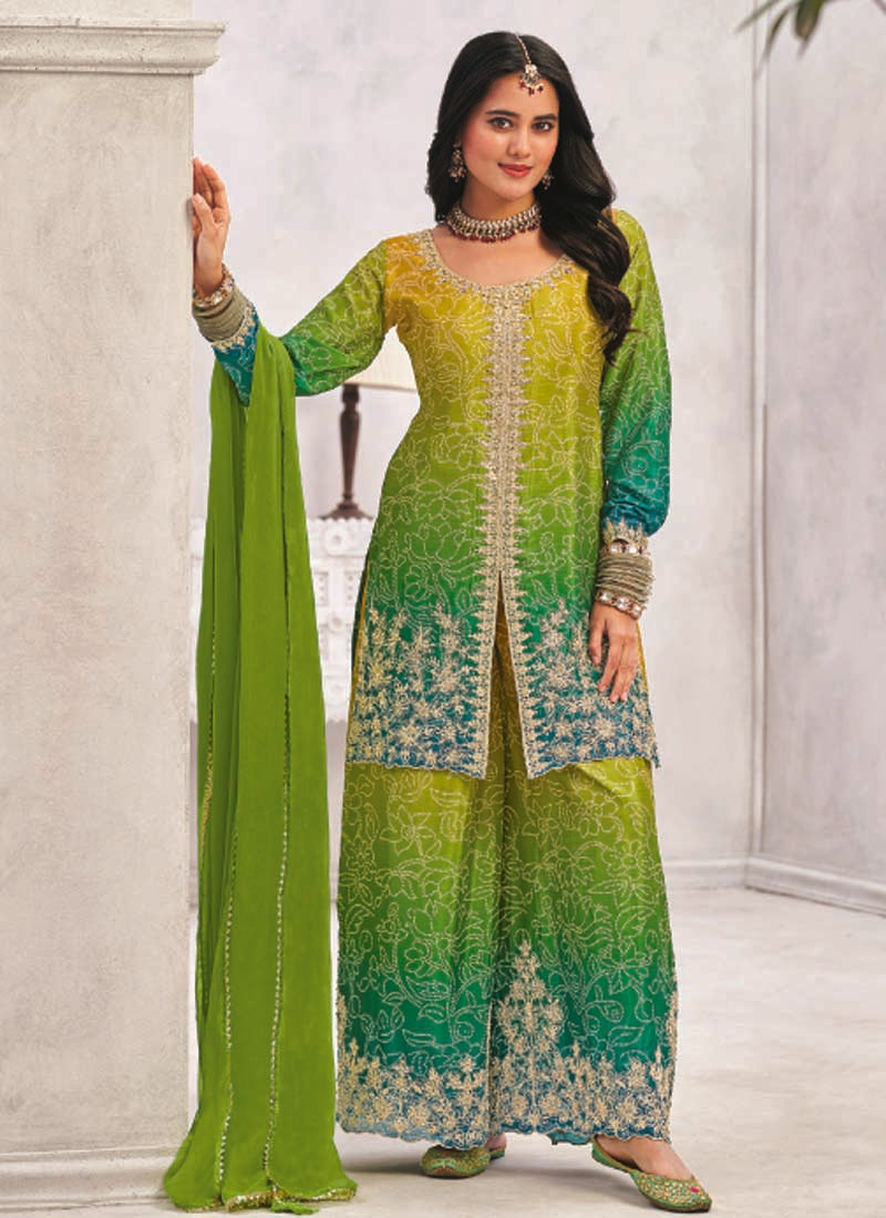 Green premium Chinon palazzo suit featuring heavy hand-work and intricate embroidery.