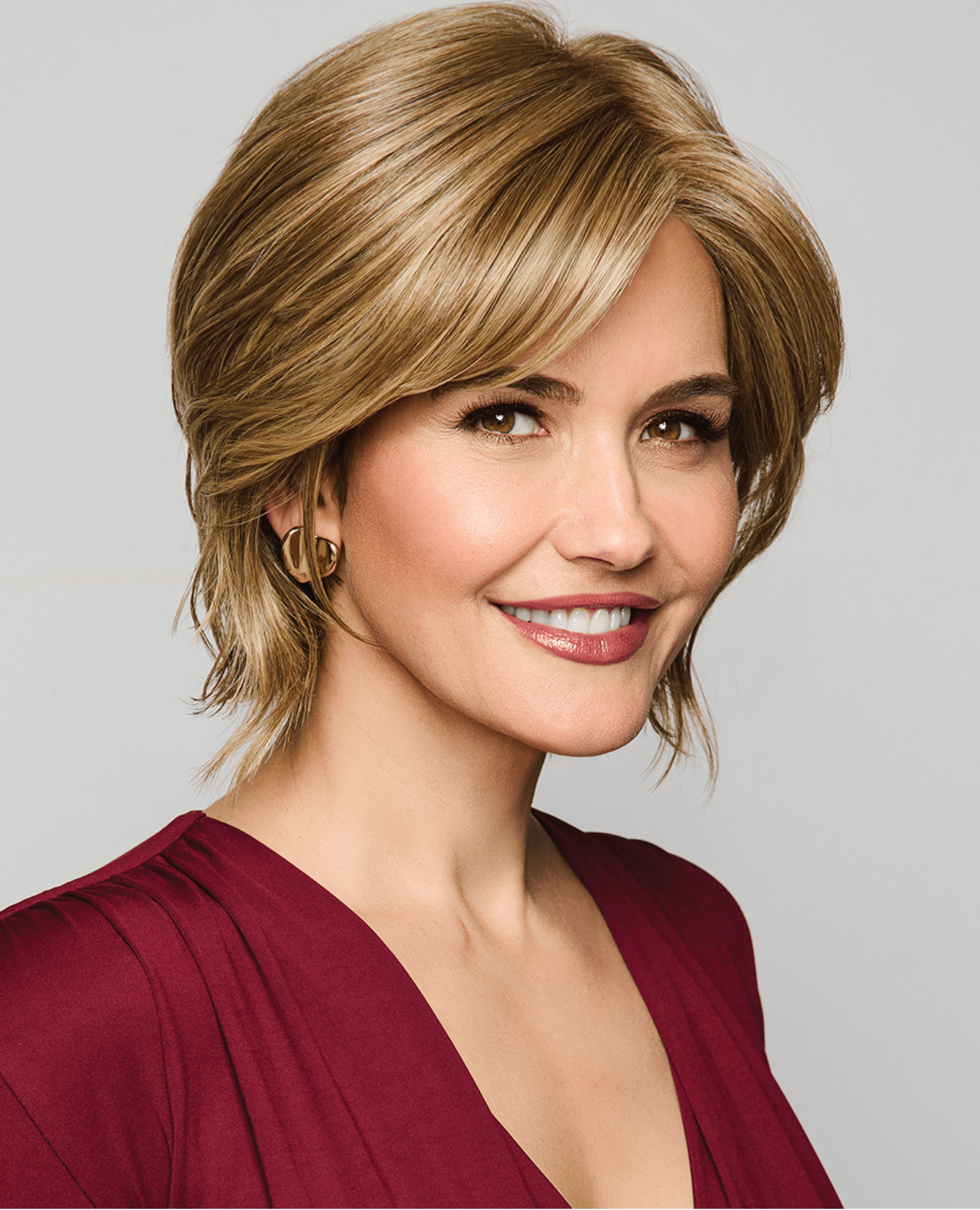 Raquel Welch Main Character chin-length bob wig in SS Biscuit color