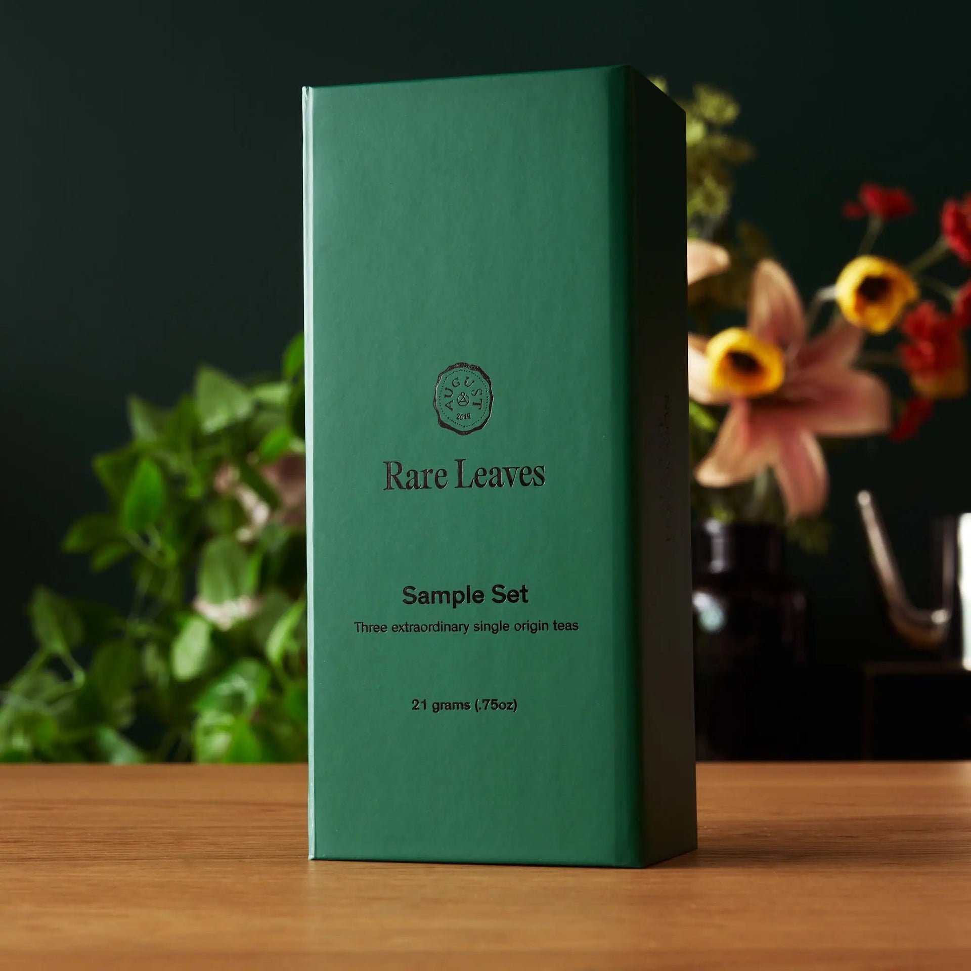 Rare Leaves single origin tea mini tin sampler set box open showing three black tea tins inside