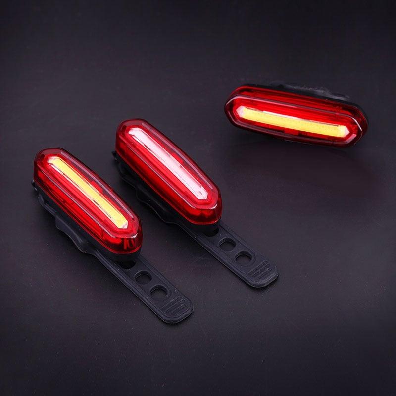 High-intensity LED USB rechargeable bicycle tail light for road bikes.