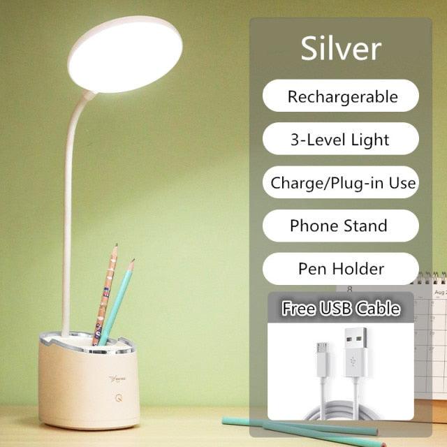 White rechargeable desk lamp with built-in phone stand and pen organizer.