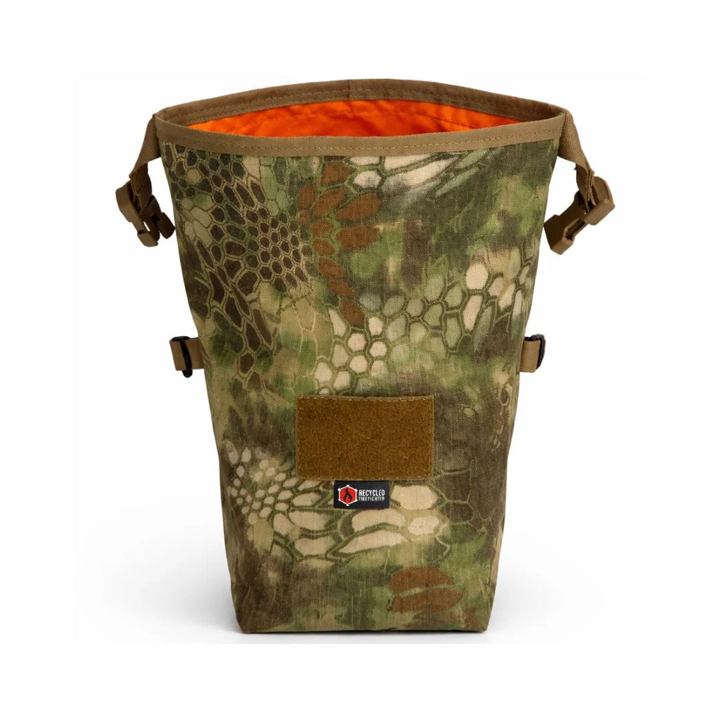 Recon Roll Top utility bag in camo pattern with orange details.