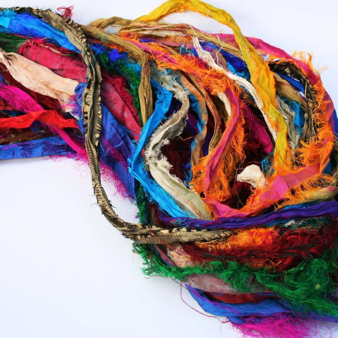 Tibet Jewels recycled sari silk ribbon featuring vibrant jewel tones and gold accents