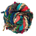 Close-up of Istanbul Sparkle recycled sari silk ribbon featuring twisted jewel-toned jewel-tones