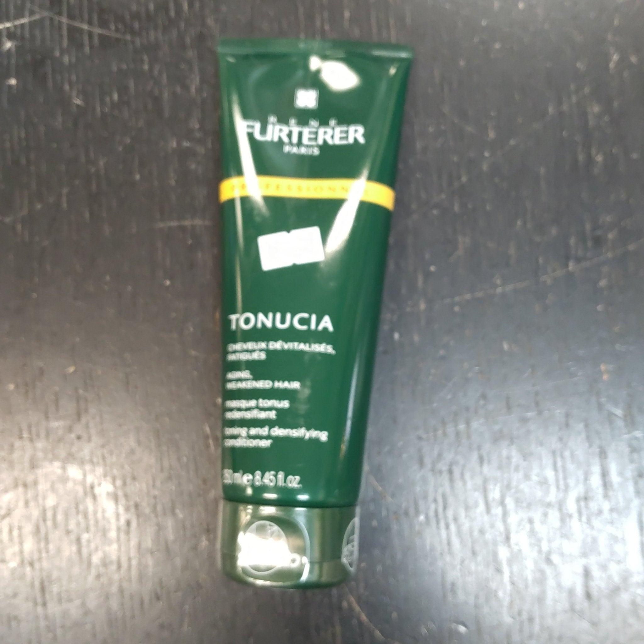 Rene Furterer Tonucia Toning and Densifying Conditioner tube in deep forest green packaging