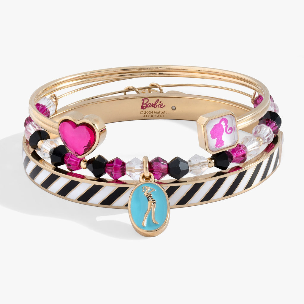 Set of three Retro Barbie beaded bangles featuring pink, black, and crystal beads with a blue enamel silhouette charm.