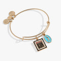 Retro Barbie charm bangle with a blue enamel silhouette charm and a Forever Icon square charm