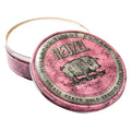 Reuzel Pink Grease Pomade 4oz tin featuring classic barber styling packaging
