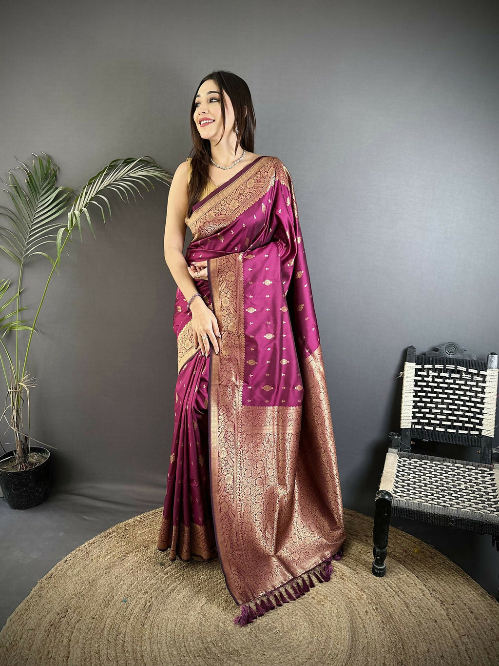 Magenta Lichi Silk Banarasi Saree with intricate gold zari weaving motifs