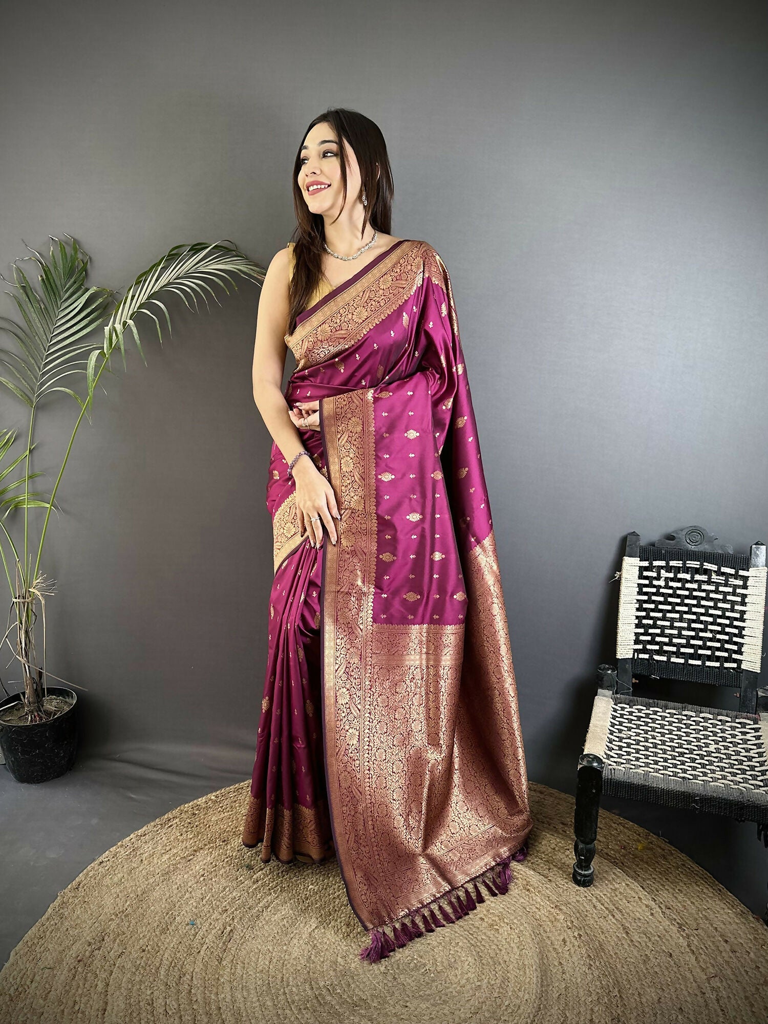 Magenta Lichi Silk Banarasi Saree with intricate gold zari weaving motifs