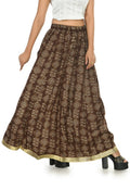 A floor-length coffee brown cotton lehenga with geometric gold prints and a relaxed A-line silhouette.