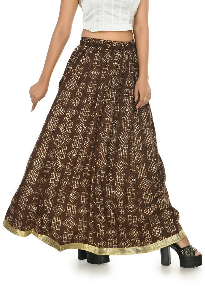 A floor-length coffee brown cotton lehenga with geometric gold prints and a relaxed A-line silhouette.