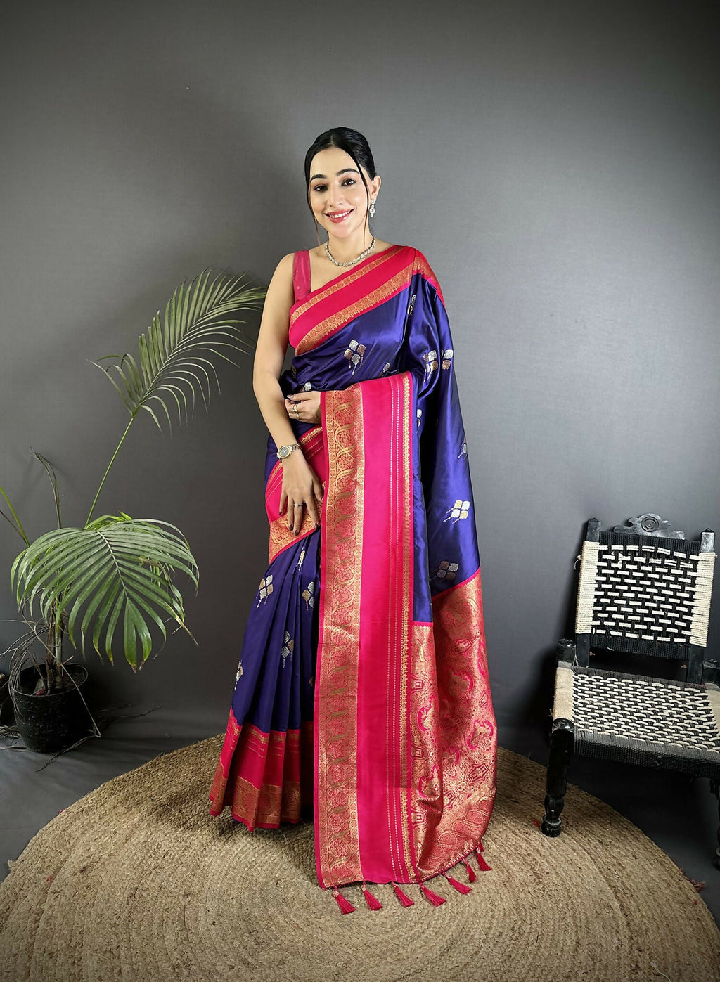 Elegant violet Banarasi soft silk saree with intricate woven patterns and contrast magenta blouse